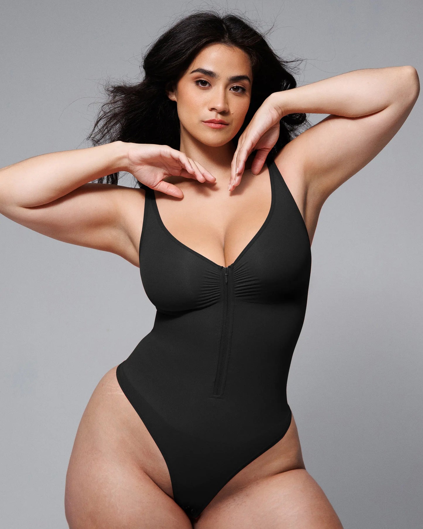 Bare Essentials™ Skin Flow™ Zipper Front Thong Bodysuit