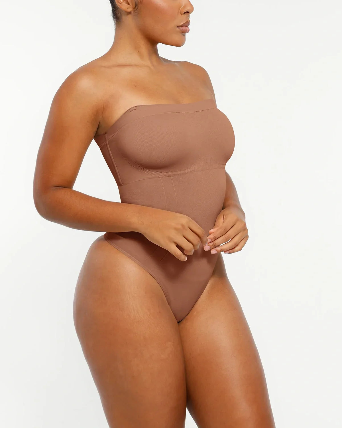 Bare Essentials™ Skin Flow™ Strapless Sculpt Thong Bodysuit